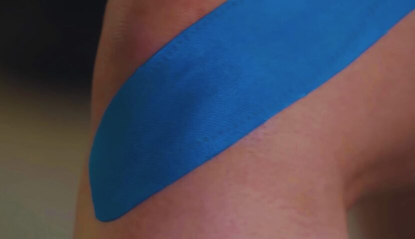 Applying K tape for shoulder