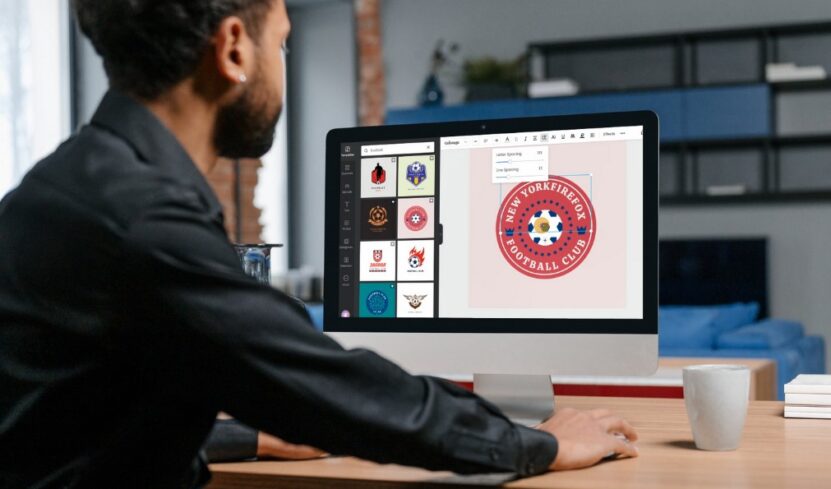 Man making soccer logo on his computer